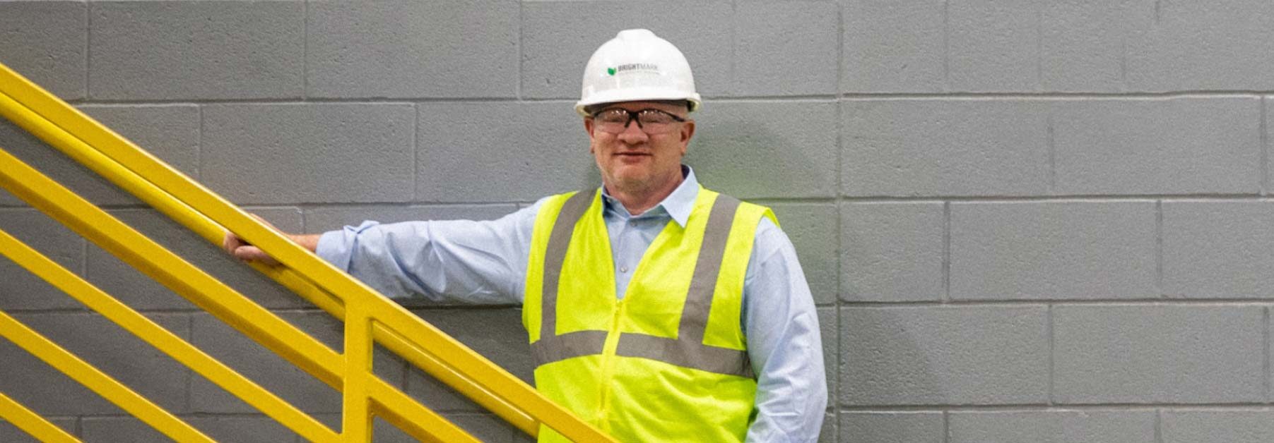 Bob Powell in hard hat and safety vest