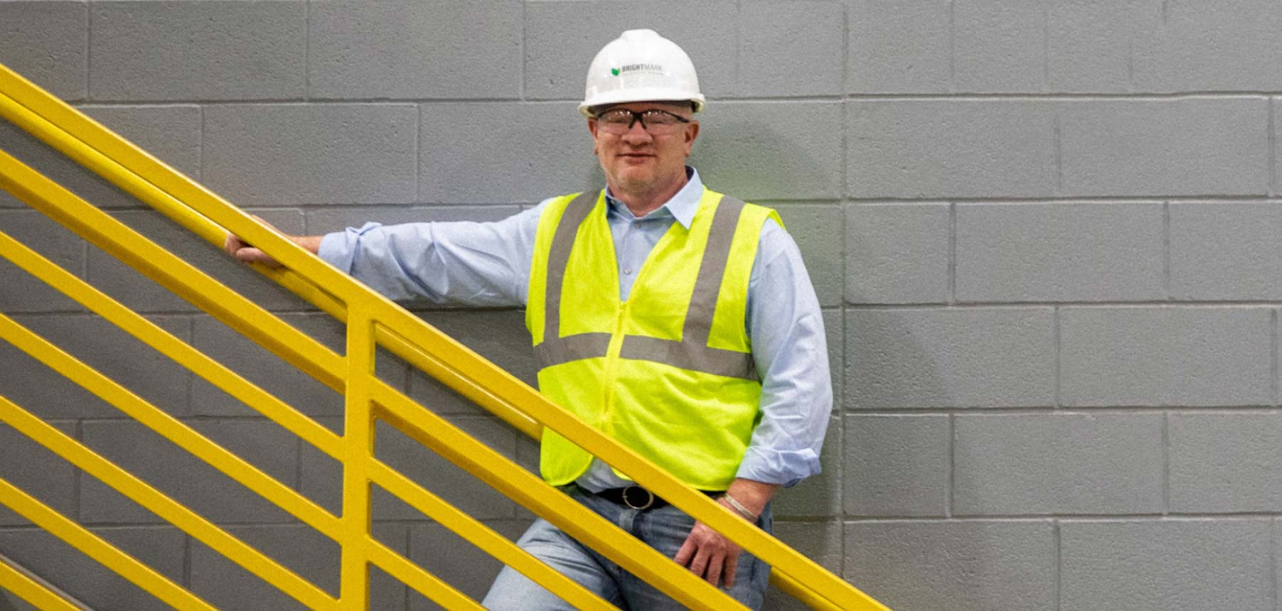 Bob Powell in hard hat and safety vest