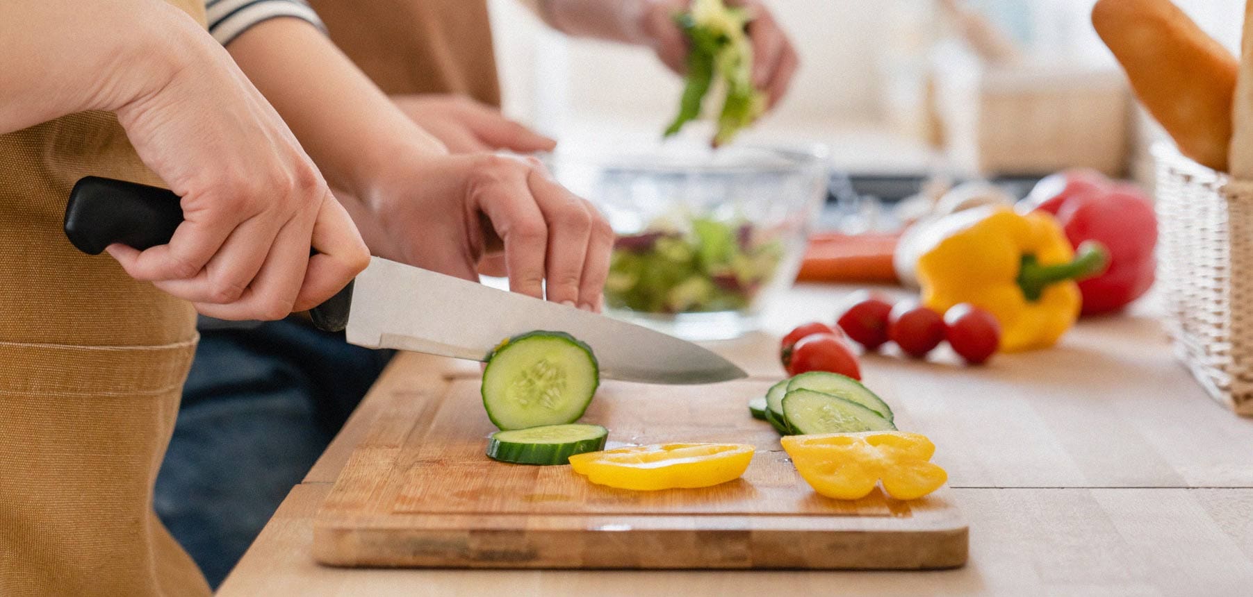 Person cutting vegetables