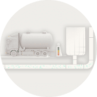 Illustration showing the remaining solids from the process being collected by a truck for re-use.